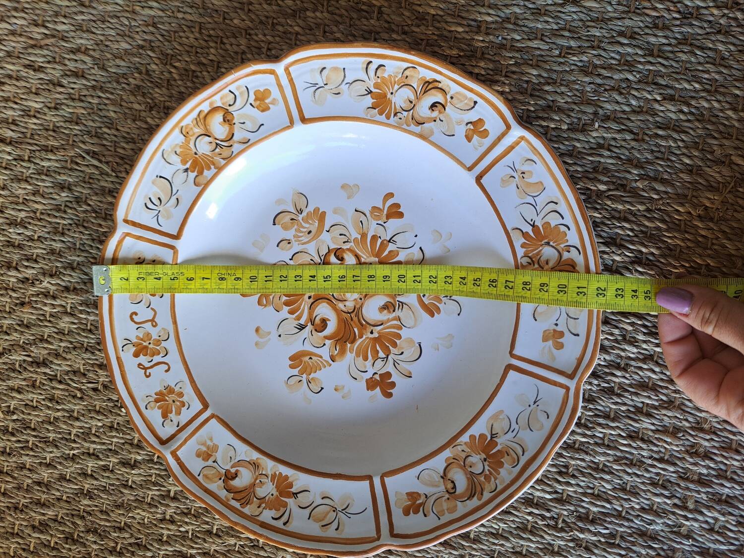 Old painted earthenware dish