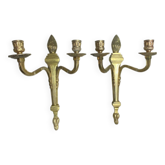 Deux bougeoirs muraux en bronze style Empire