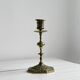 Carved brass candlestick holder