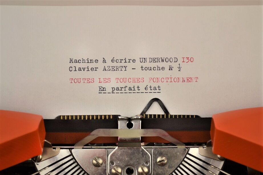 Machine à écrire orange Underwood 130 - vintage 70