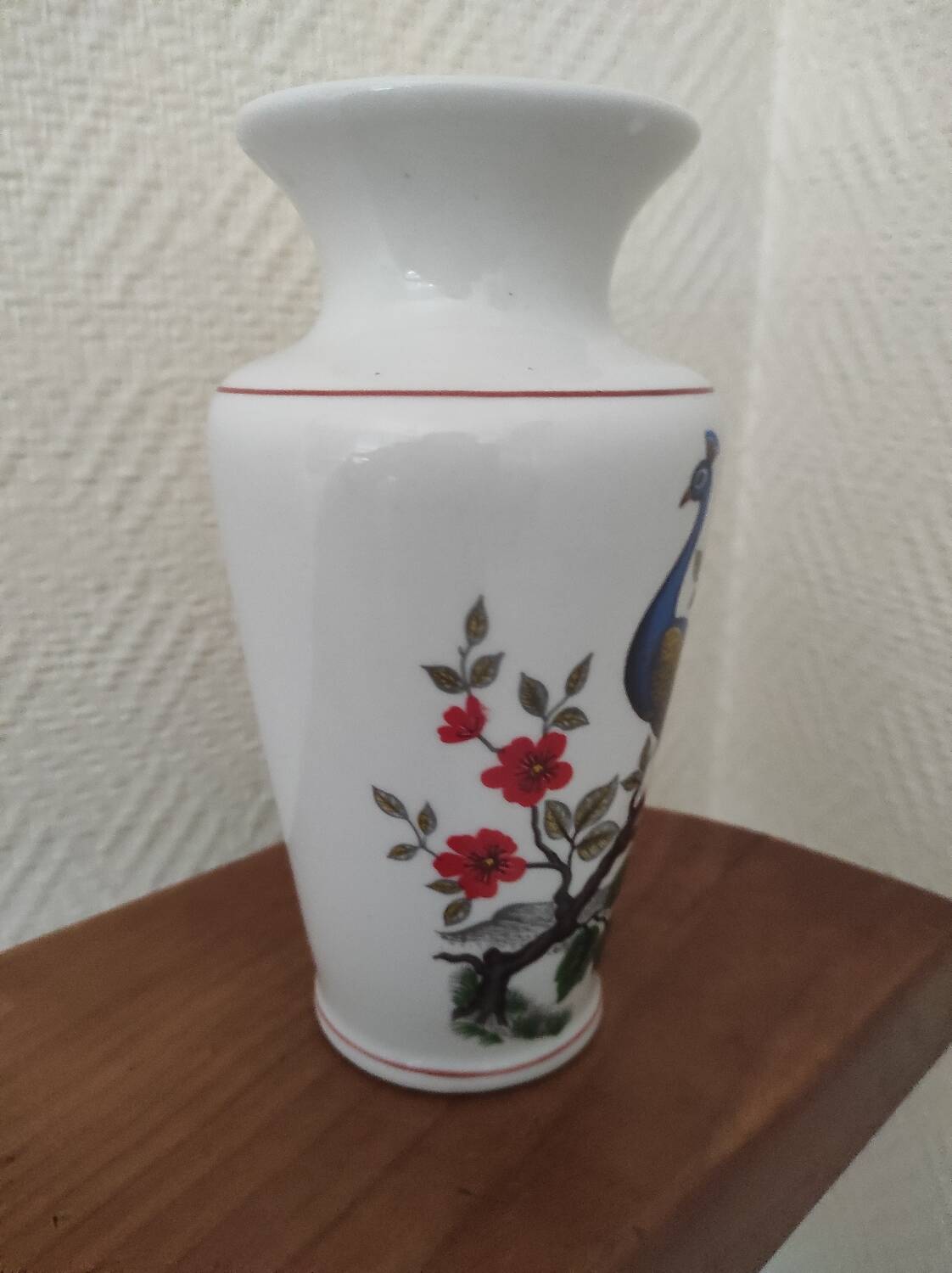 Porcelain vase with peacock decoration