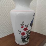 Porcelain vase with peacock decoration