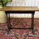 Bistro table in chestnut from the 1950s.