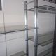 Large vintage double bookshelf from the 70s with chrome and smoked glass.