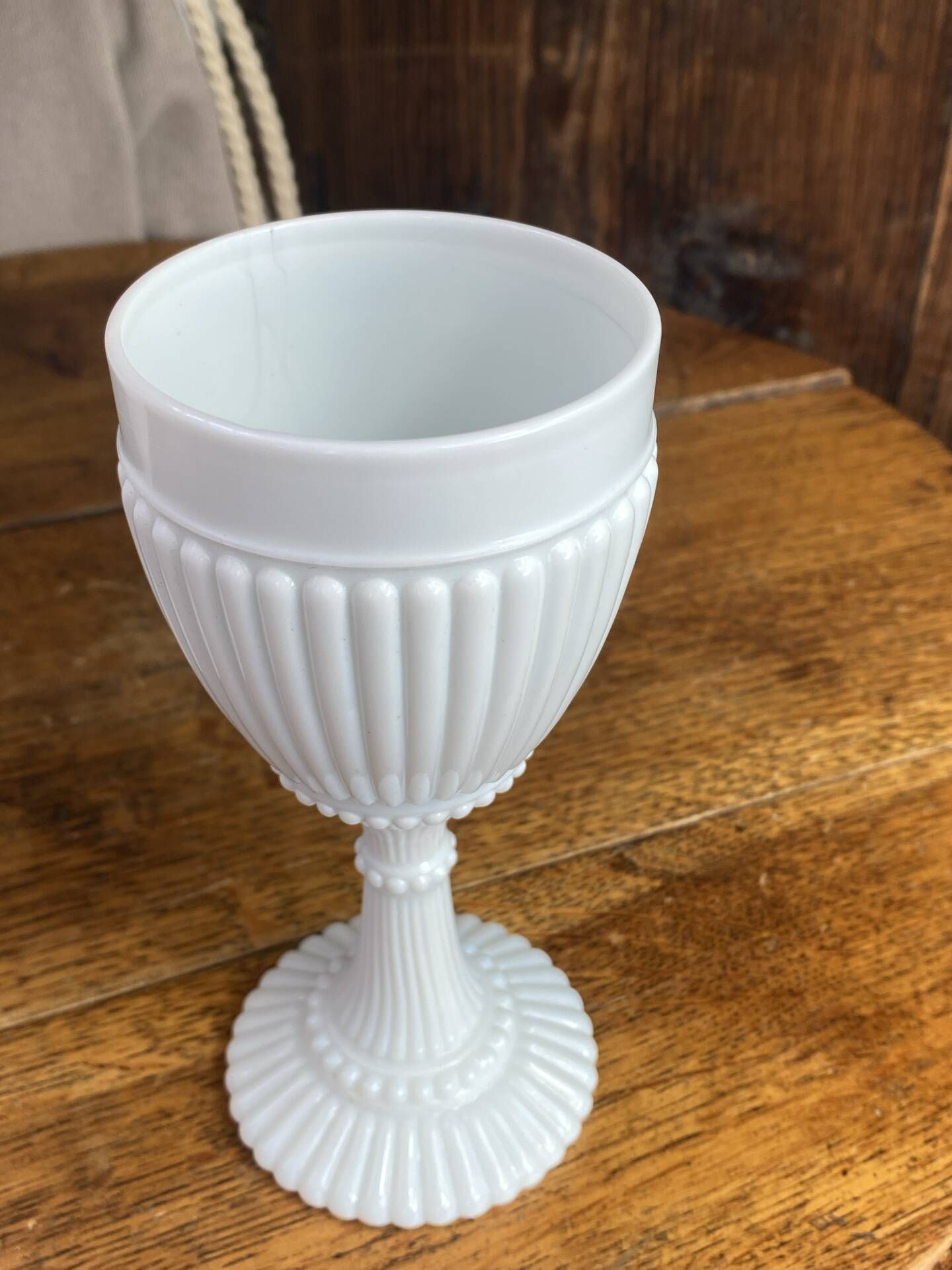 Footed glasses, white opaline chalices
