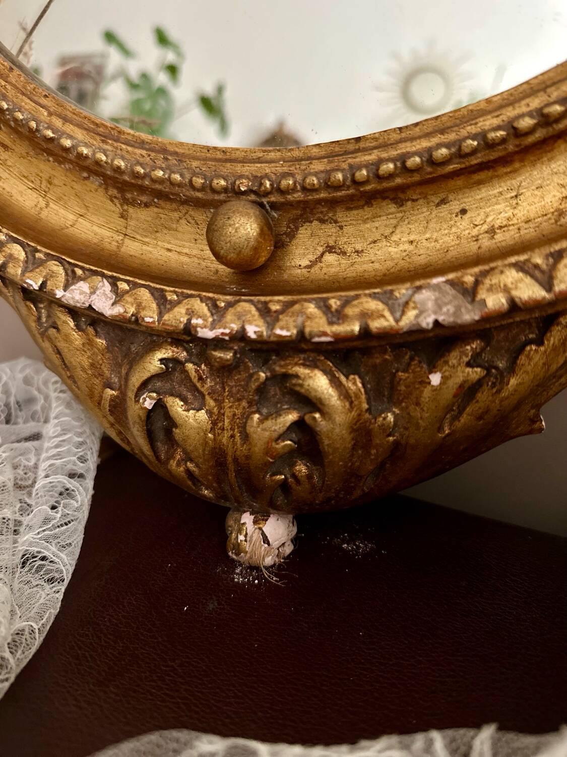 Antique gilded mirror decorated with an eagle
