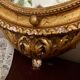 Antique gilded mirror decorated with an eagle