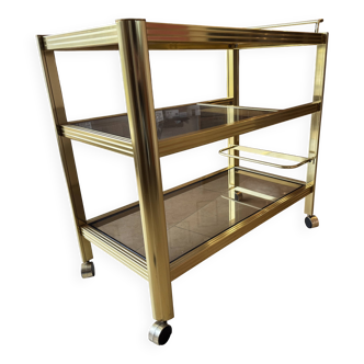 Serving table with wheels, gold-plated brass, smoked glass
