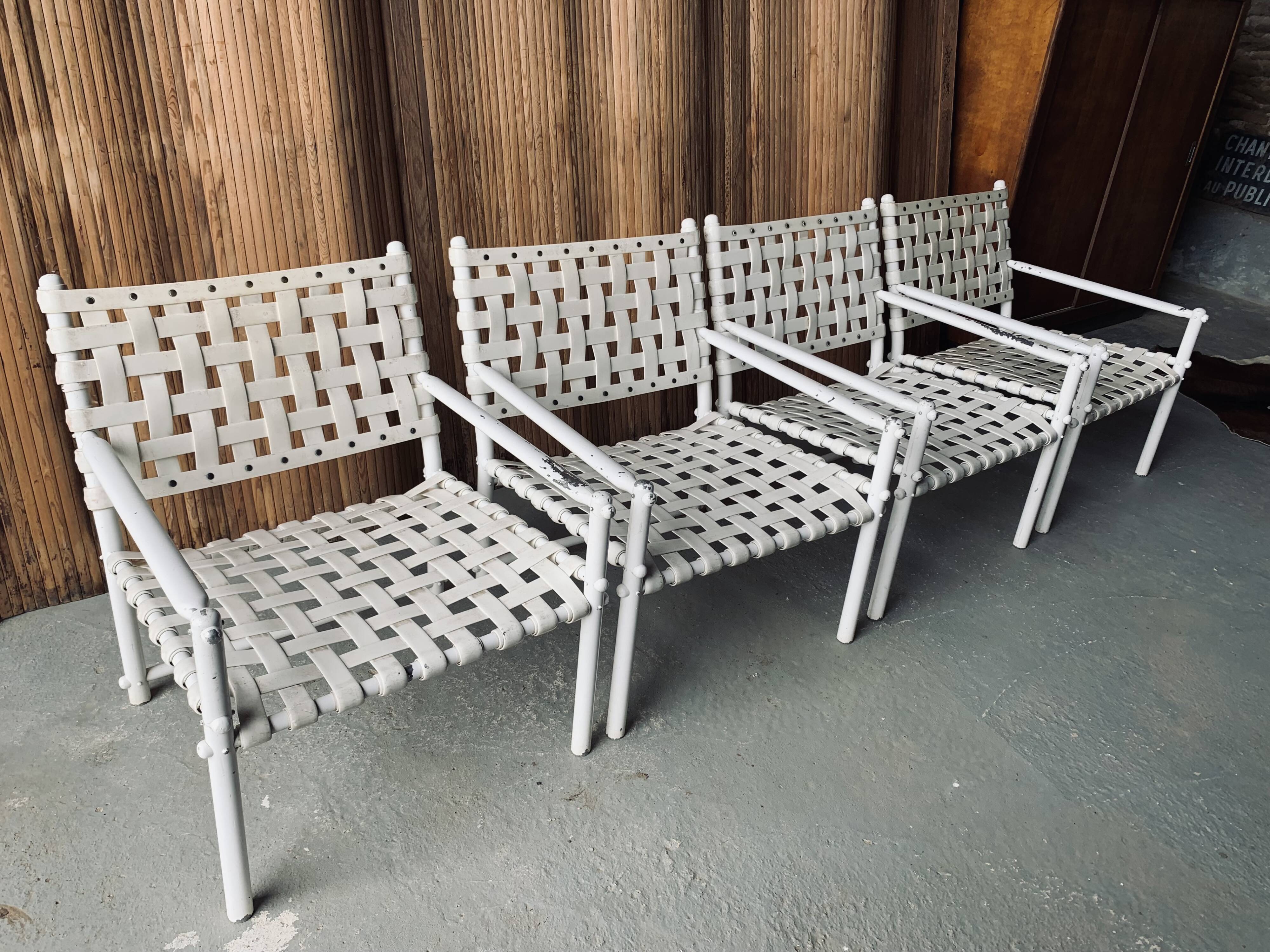 4 white Lounge Chairs Triconfort - Aluminium and plastic - 1980's
