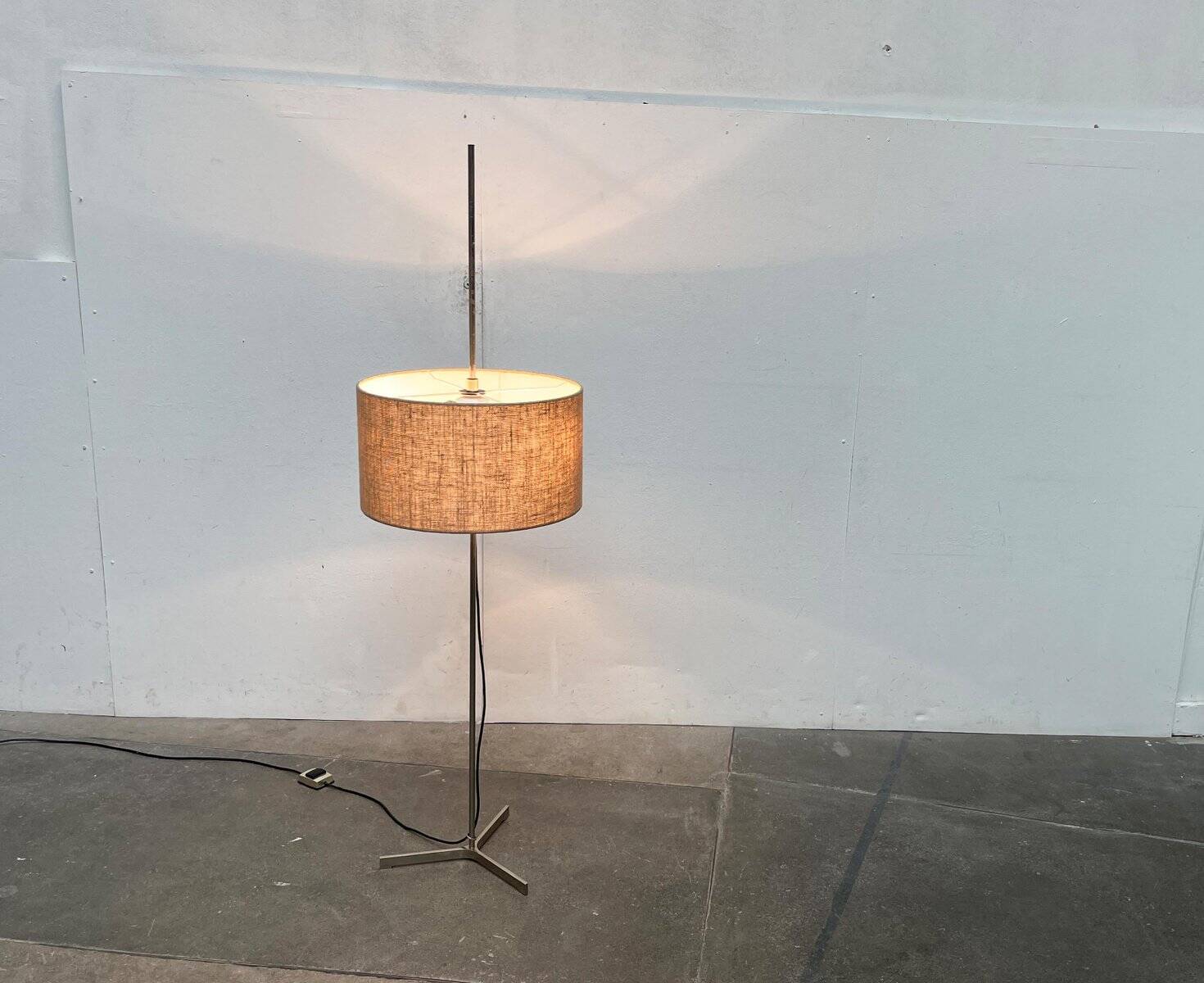 Minimalist German tripod floor lamp from the mid-century, 1960s.
