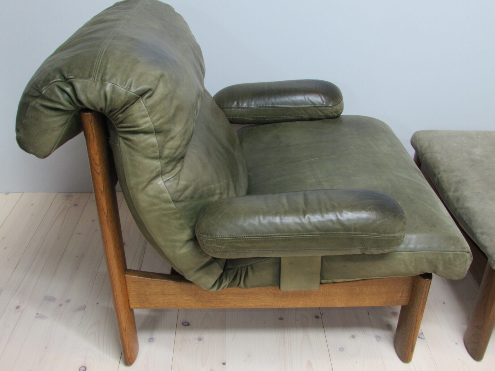 Armchair and footstool - green leather - 1960s