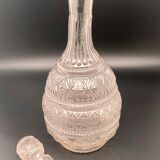 Glass decanter worked with stopper