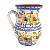 Pitcher with yellow flowers