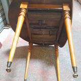 Round table with walnut shutter with extension