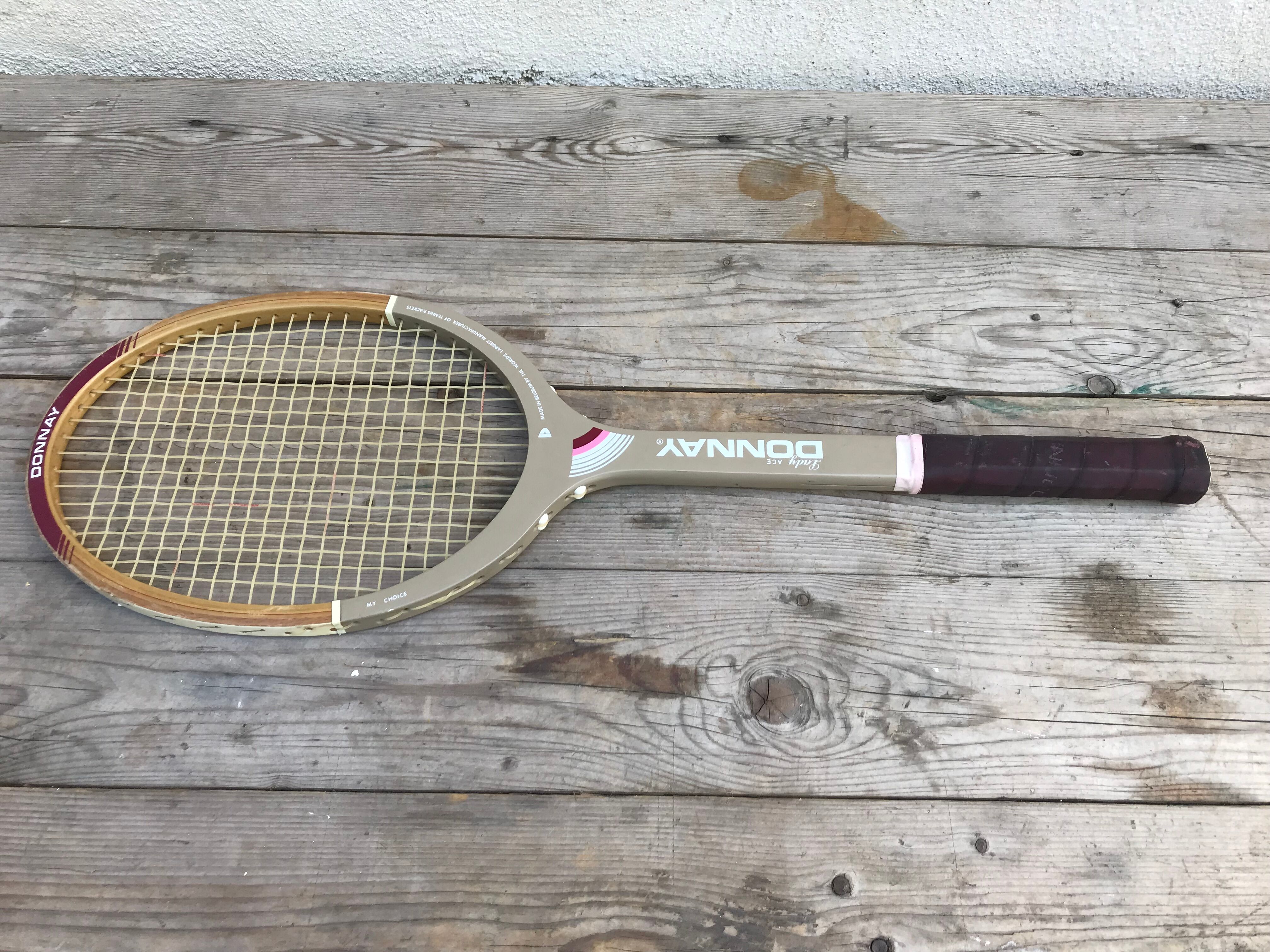 Old lady ace wood and leather vintage tennis racquet