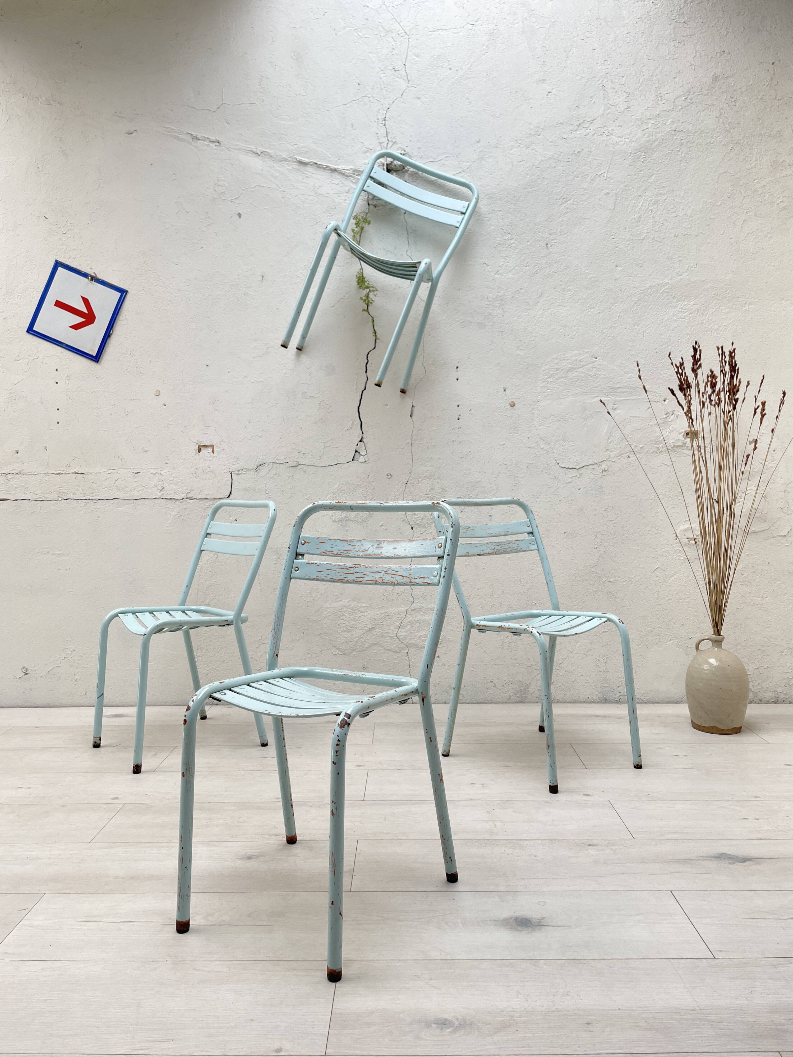 Set of four Tolix T2 chairs, circa 1950.