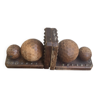 Pair of vintage carved wood and metal ball bookends