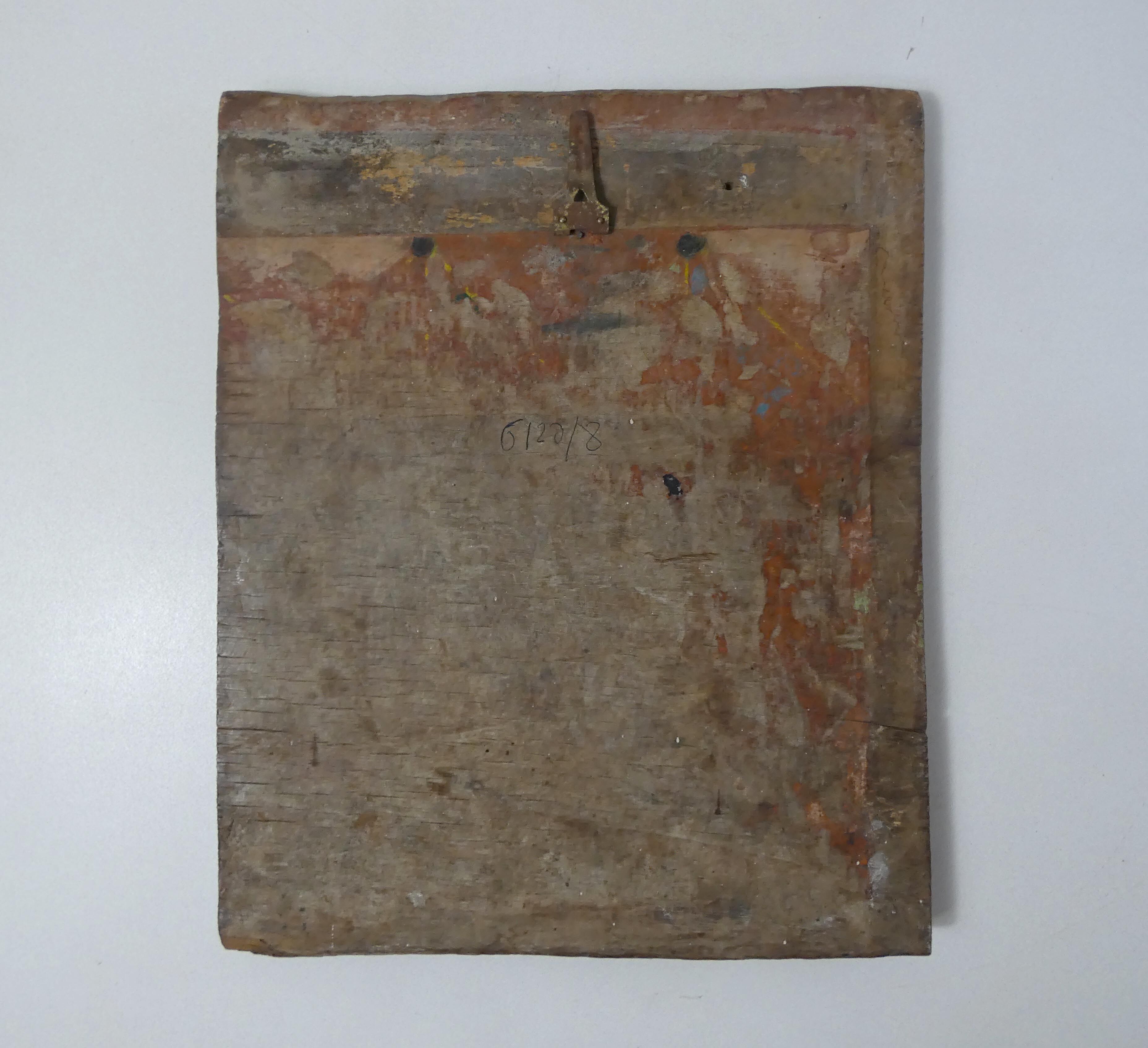 Painting on carved wood panel