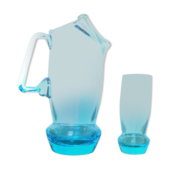 Pitcher and glass