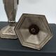 Art Deco metal candle holders.