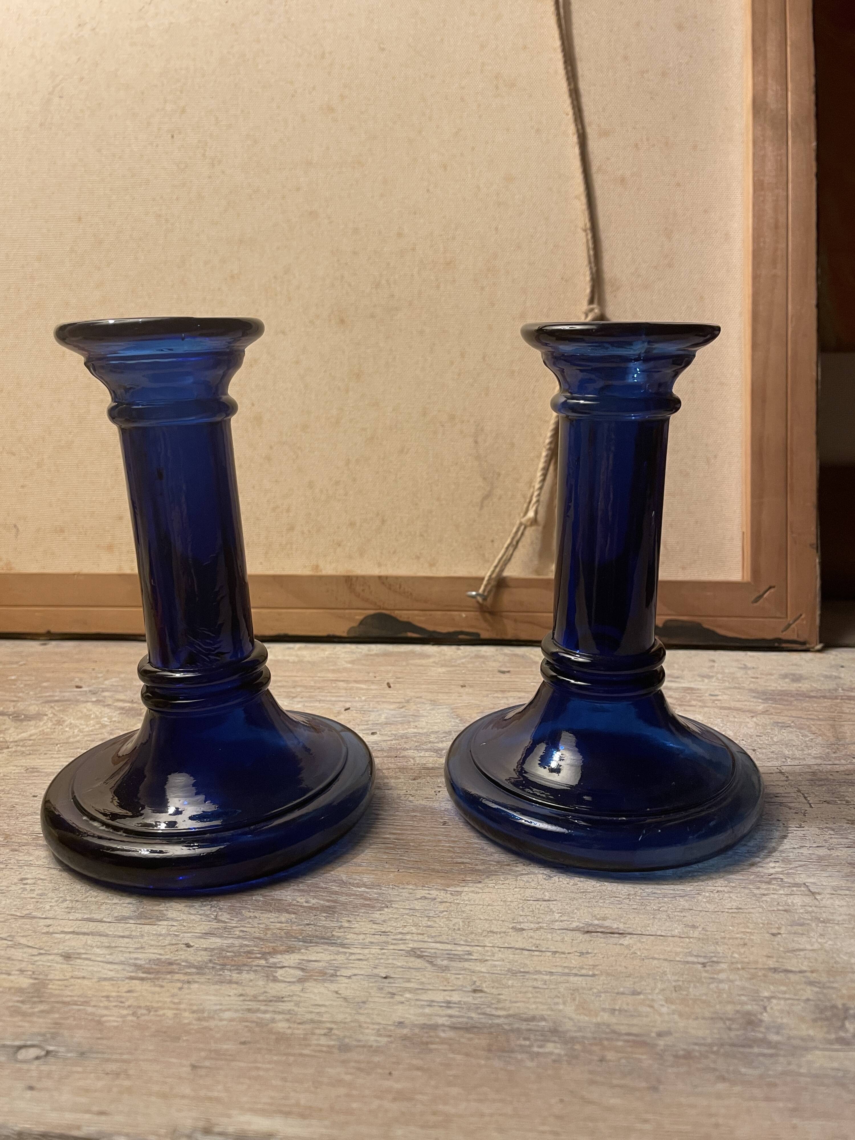 Pair of glass candle holders