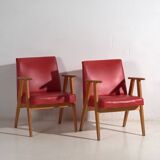 2 red armchairs, circa 1960