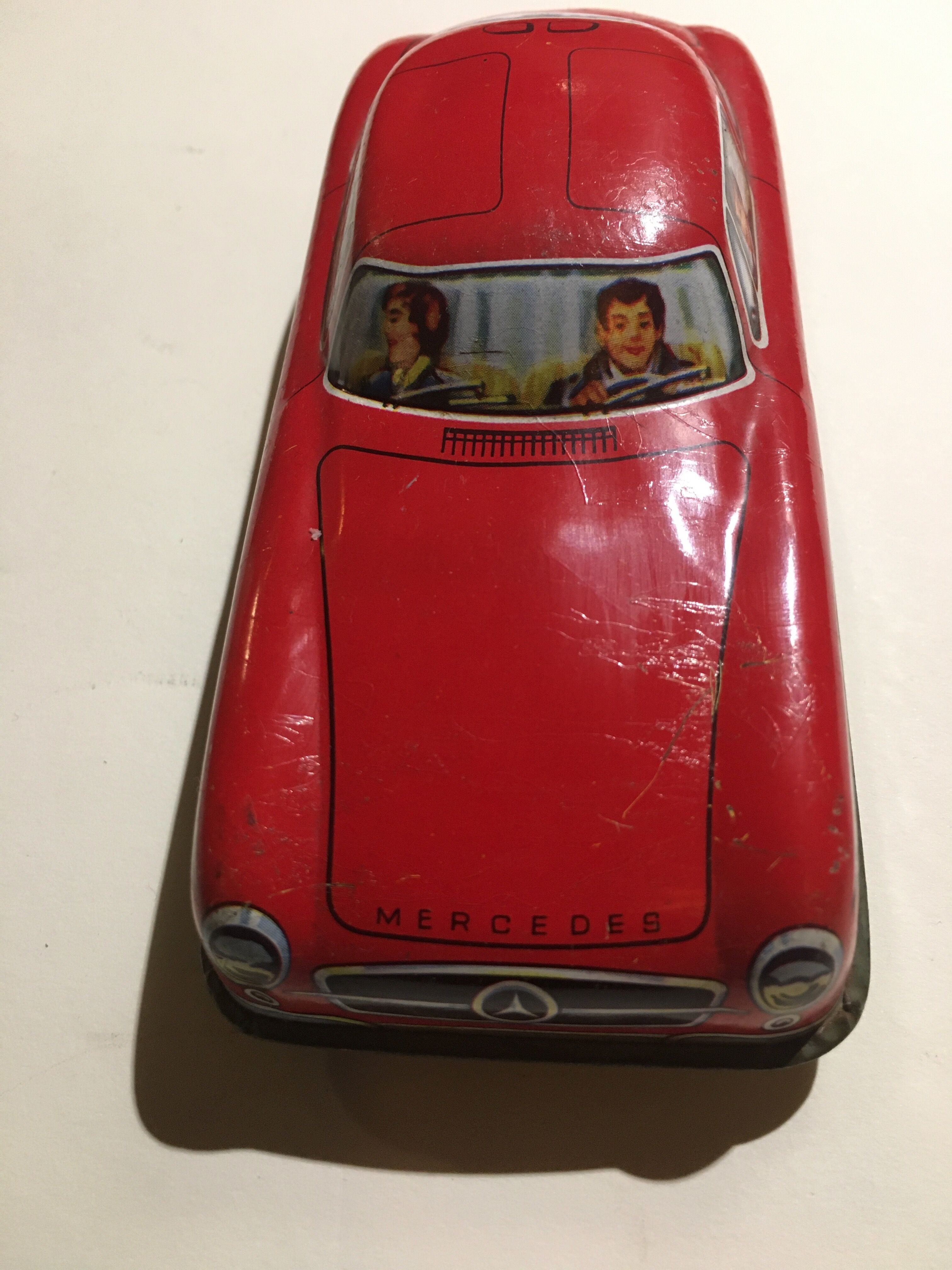Mercedes miniature car in lithographed sheet metal