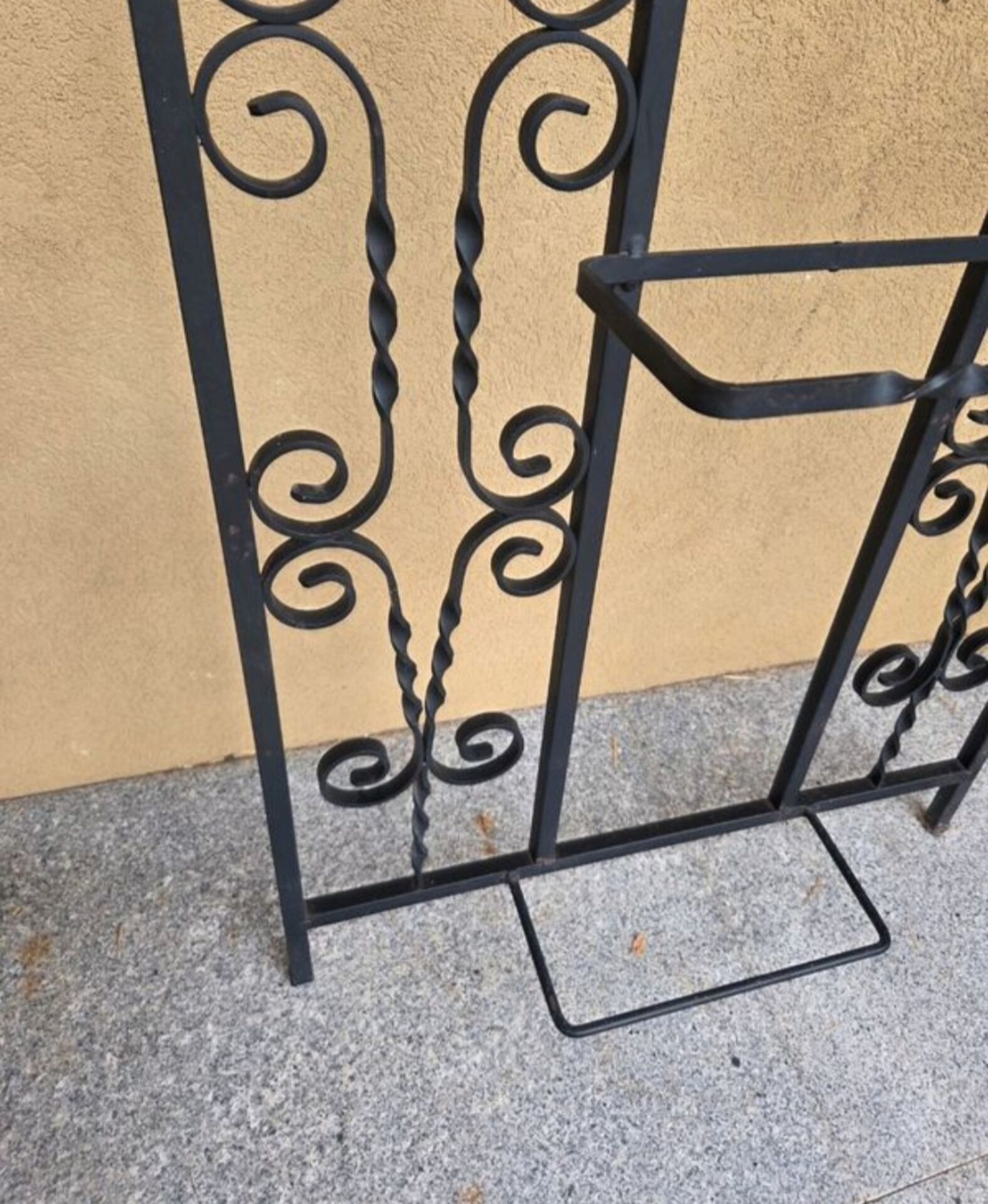Large vintage wall coat rack in wrought iron with mirror and shelf.