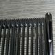 Paire de chaises spaghetti scoubidou noires années 70
