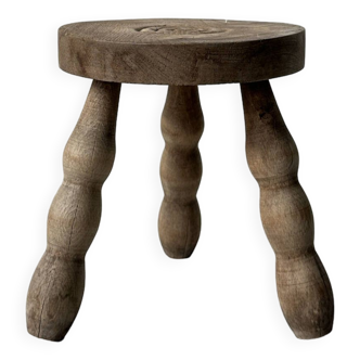 Wooden stool with twisted legs