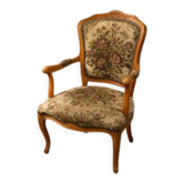 Floral tapestry armchair in Louis XV style with a carved wooden frame, 1950s–1970s.