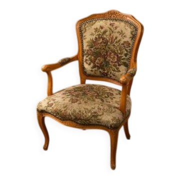 Floral tapestry armchair in Louis XV style with a carved wooden frame, 1950s–1970s.