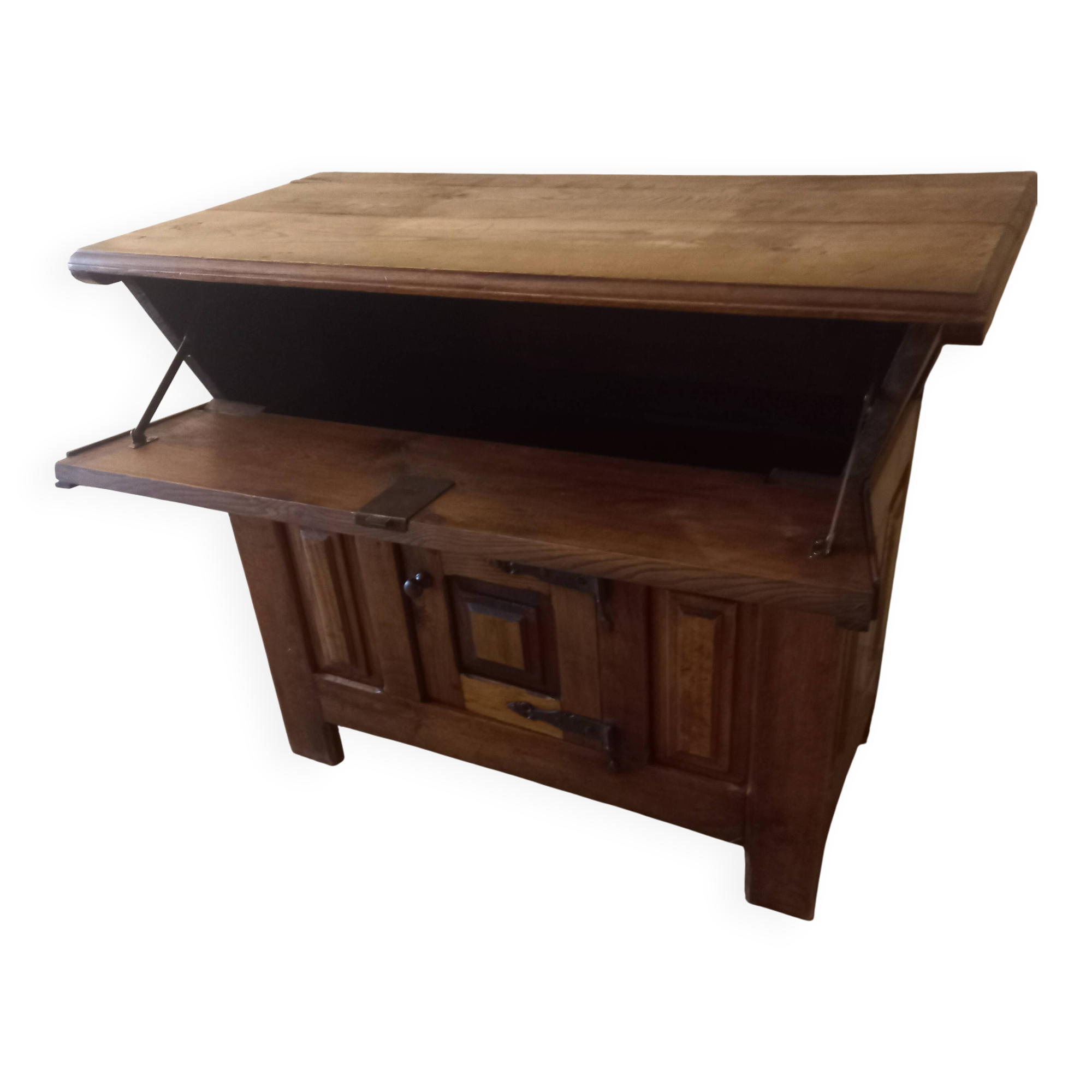 Old solid wood dough mixer carefully transformed into a bar cabinet.