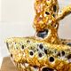 Enamelled ceramic candle holder