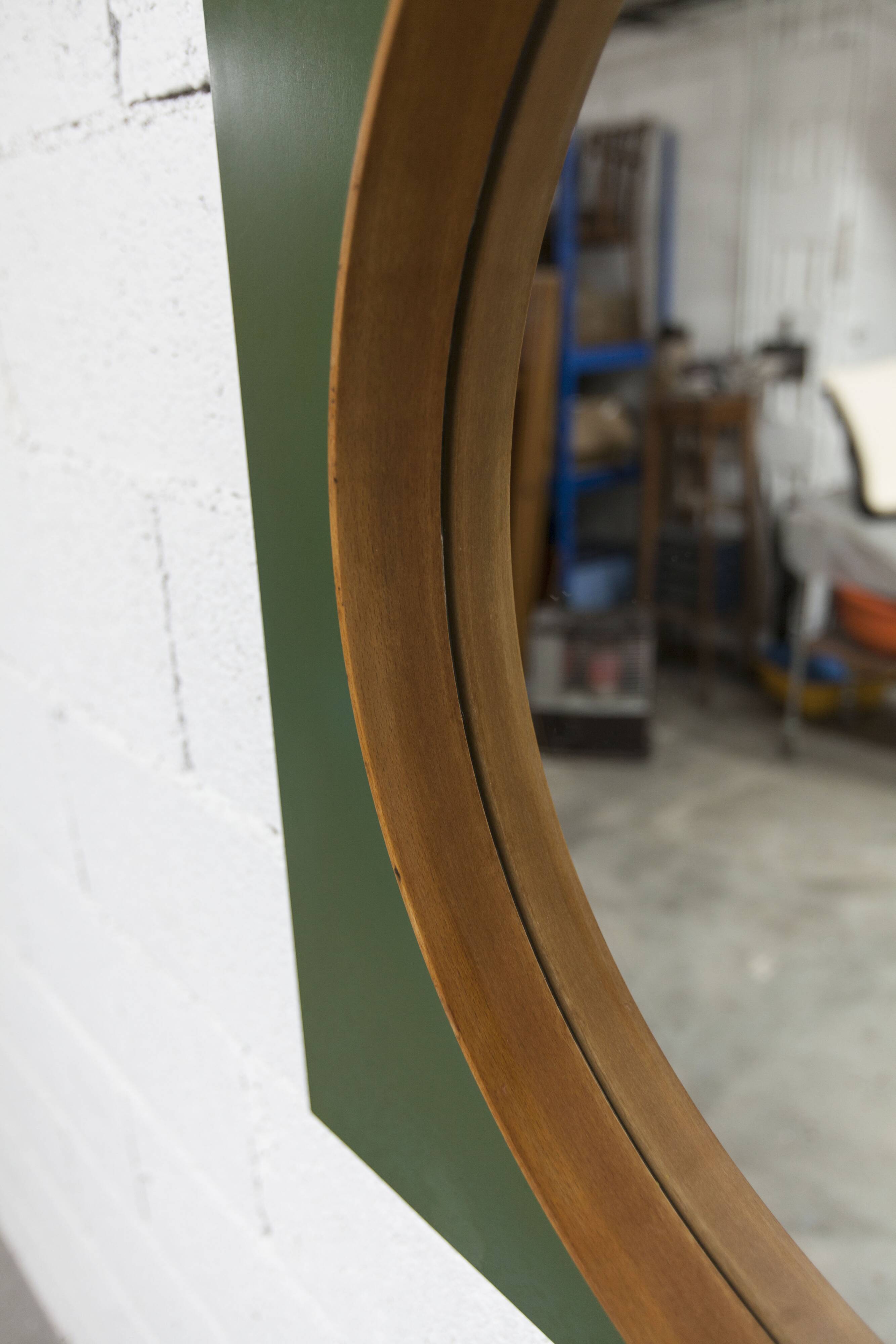 Unusual round wall mirror 60 cm teak edge on green rectangular board 1960.