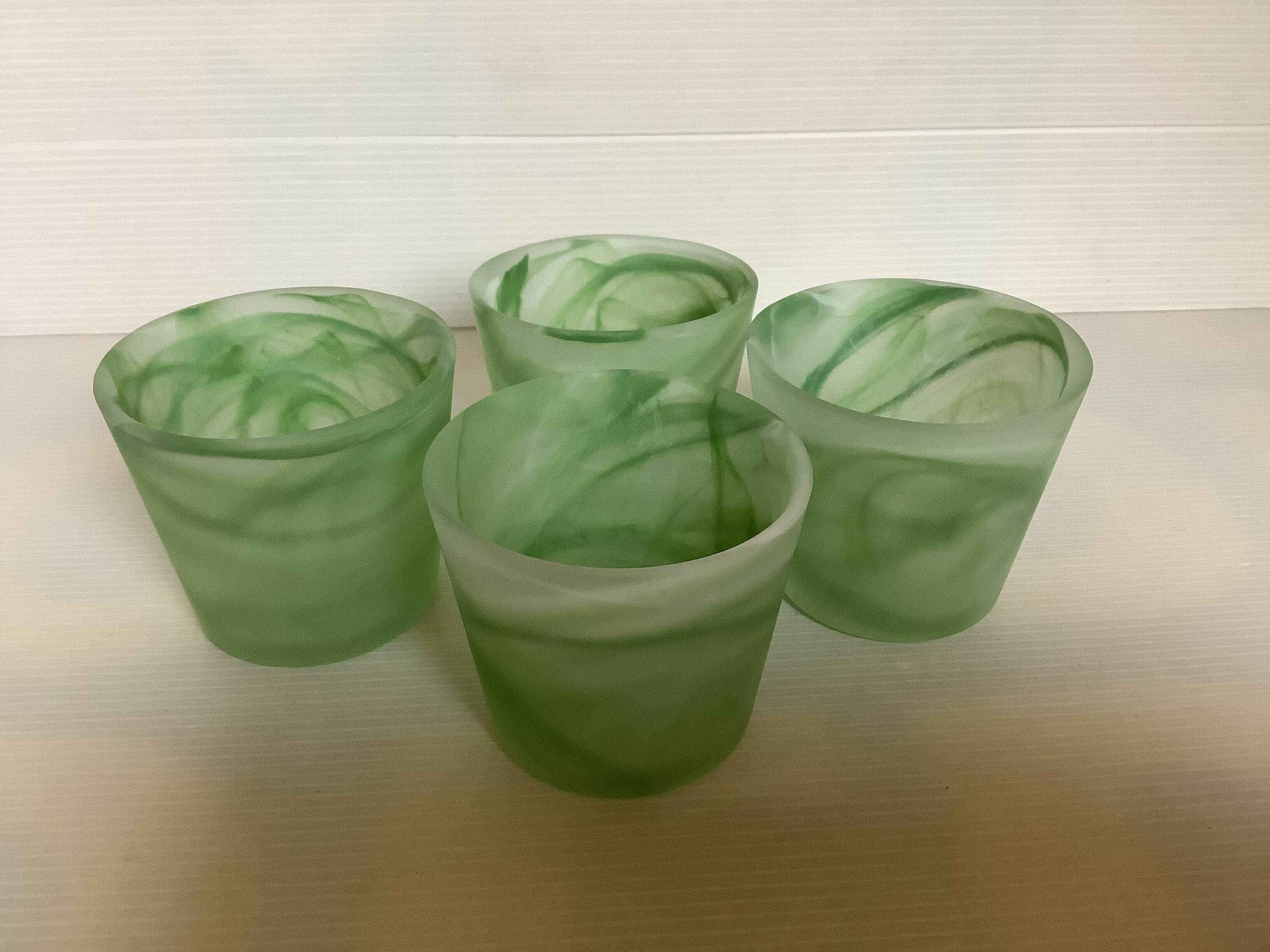 Four green glass paste candle holders