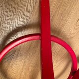 Red Baumann parrot coat rack