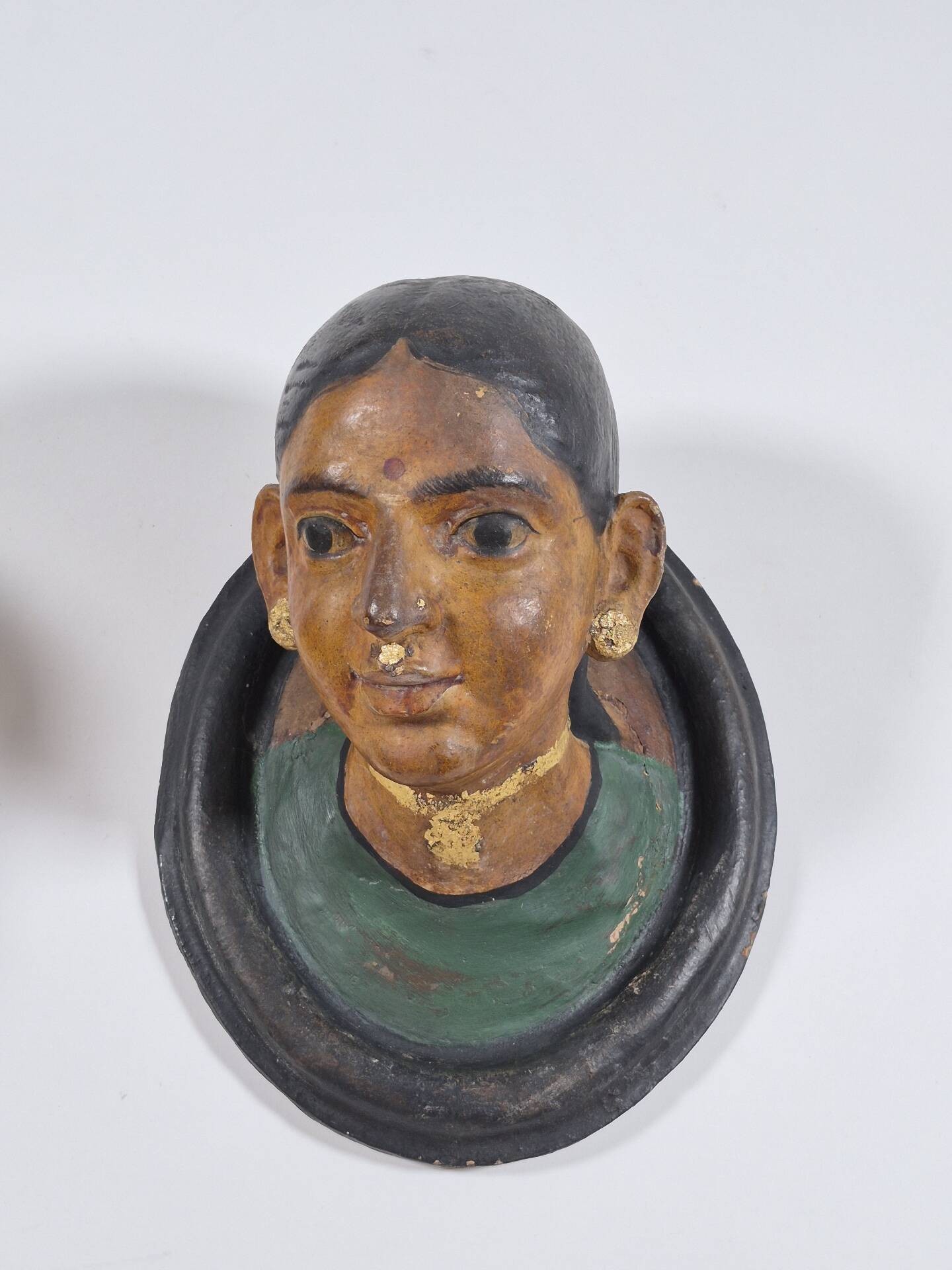 Pair of antique ceramic portrait busts from Rajasthan