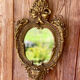 oval decorative wall mirror in Louis XV style