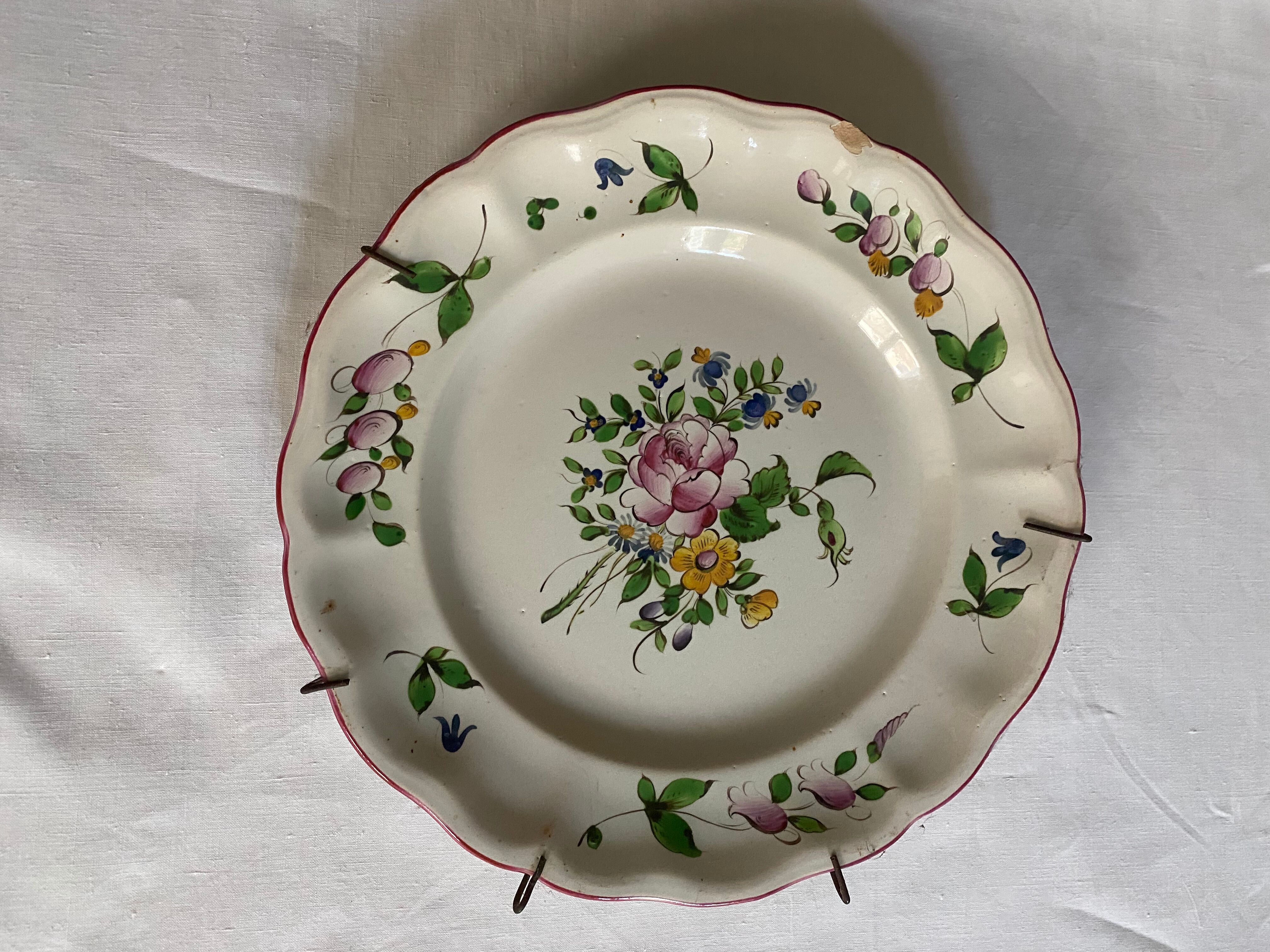 Plate of Nevers in earthenware late eighteenth century floral decoration