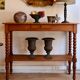 Large console or shop sideboard in pitch pine, early 20th century.