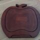 Foldable fruit basket in the shape of an apple.