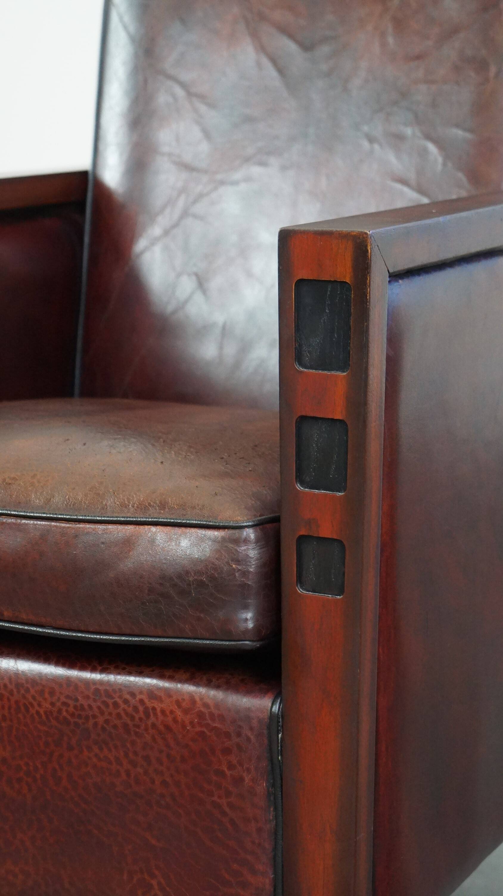 Sheepskin Art Deco design armchair combined with wood