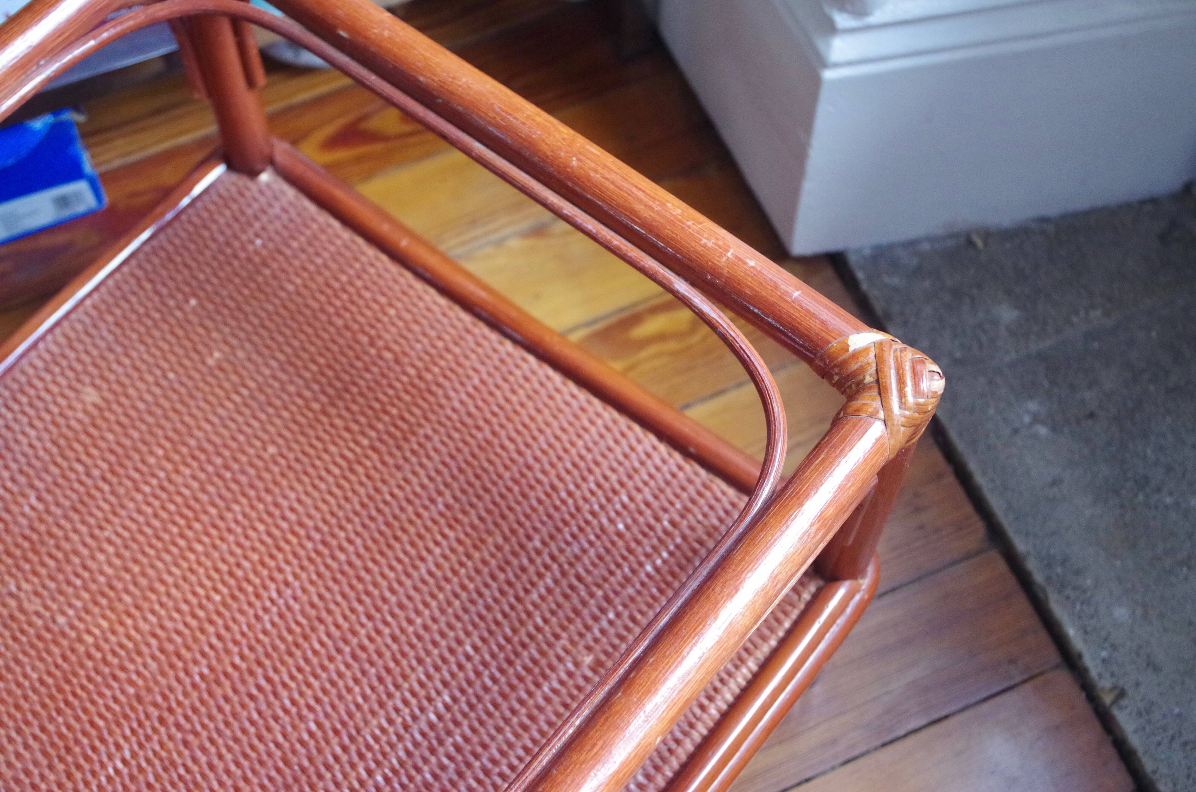 Varnished rattan coffee table and smoked glass top