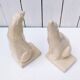 Cracked ceramic bookends with a couple of bears
