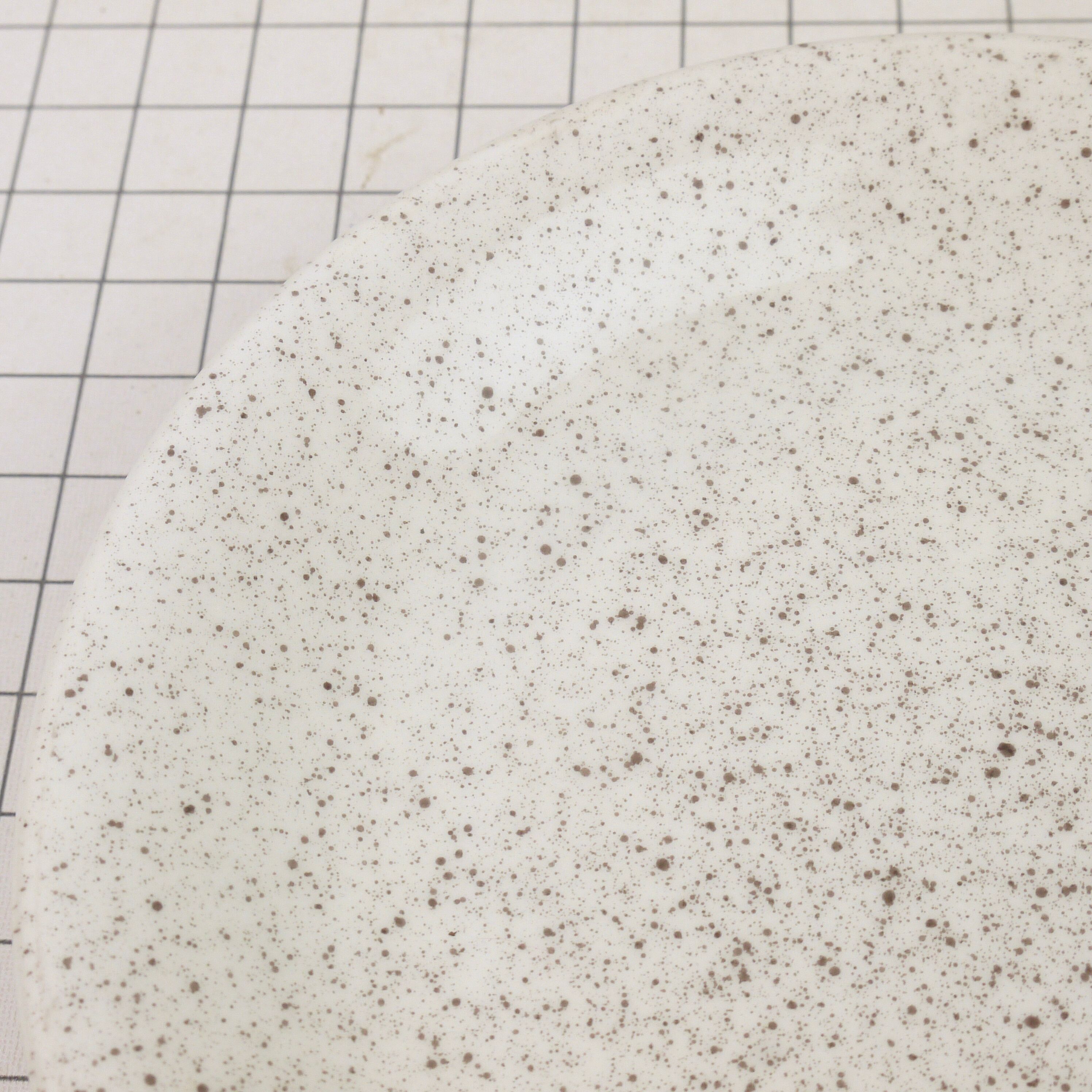 Four Ceraminter dessert plates