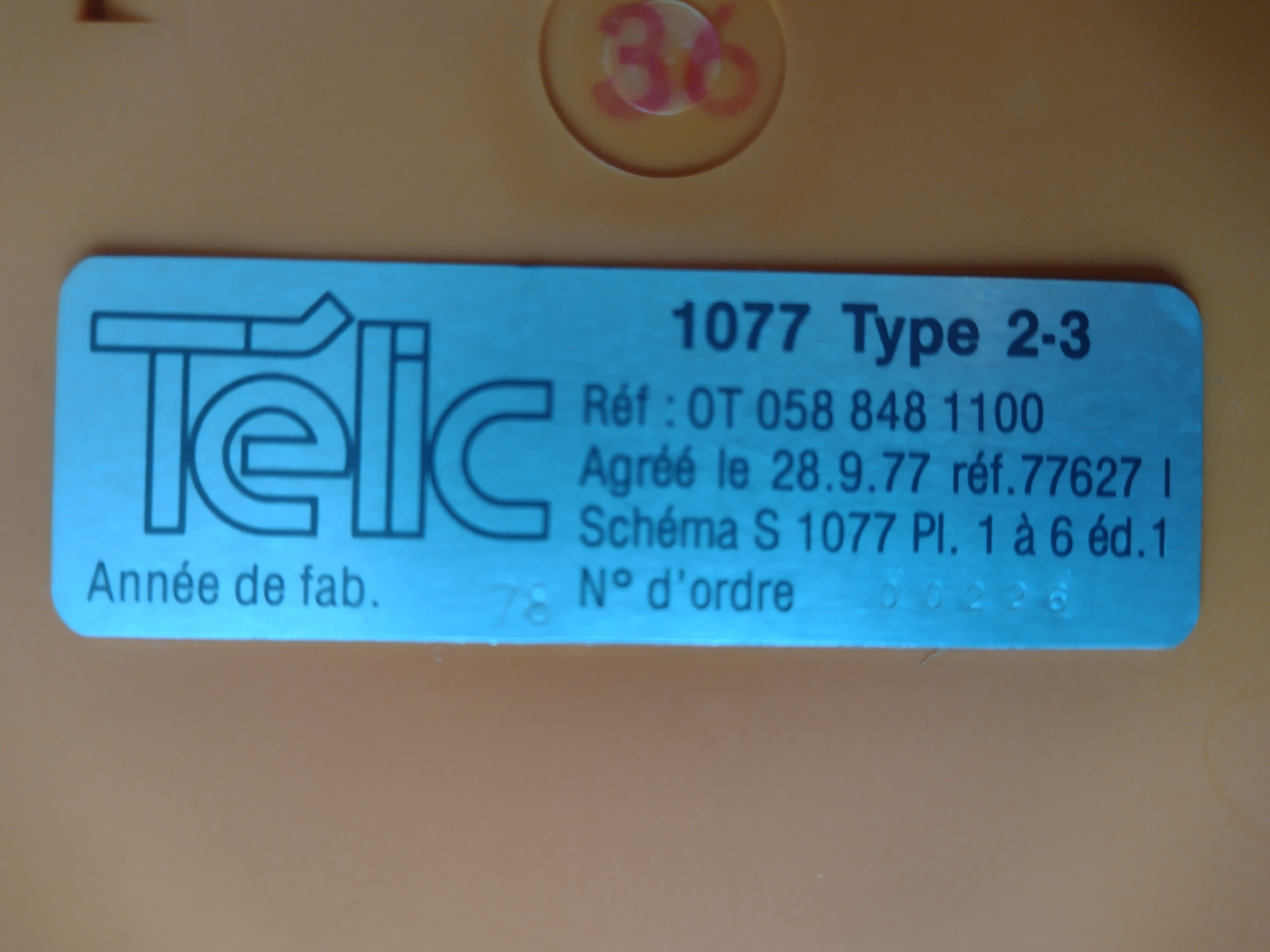 Vintage orange telic phone with ptt dial