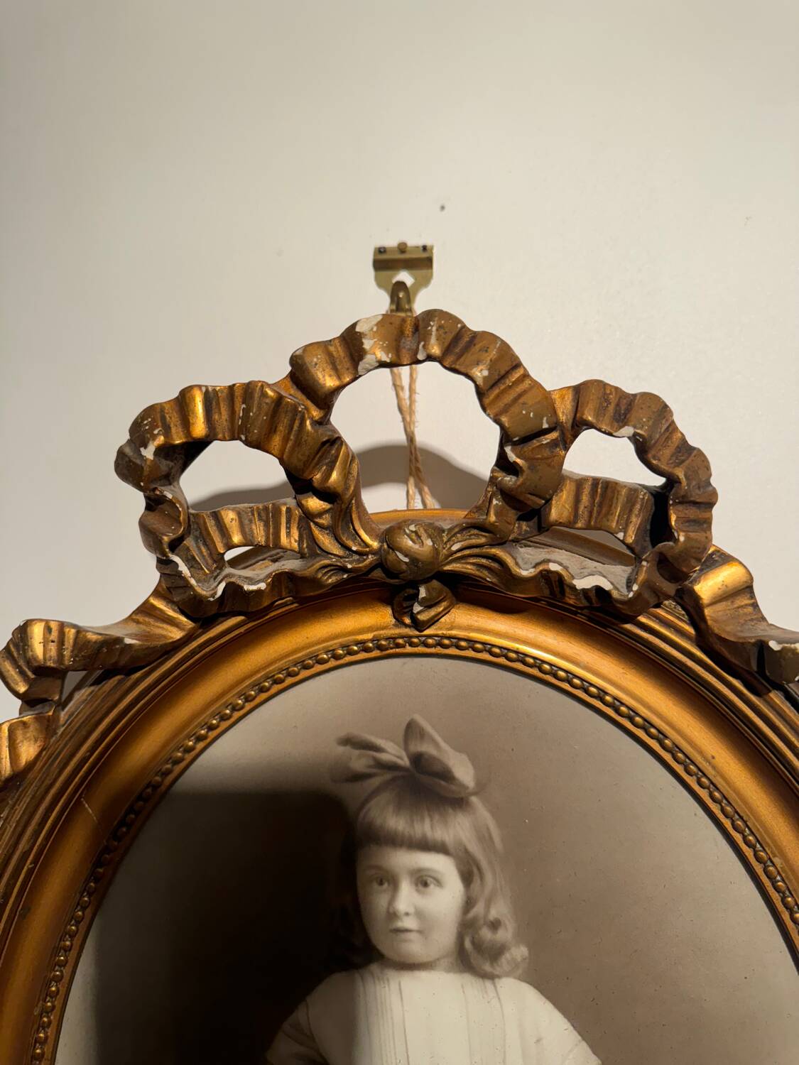 Old photograph, young girl with ribbon, 19th century