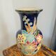 Large multicoloured ceramic vase with floral decoration signed NT.