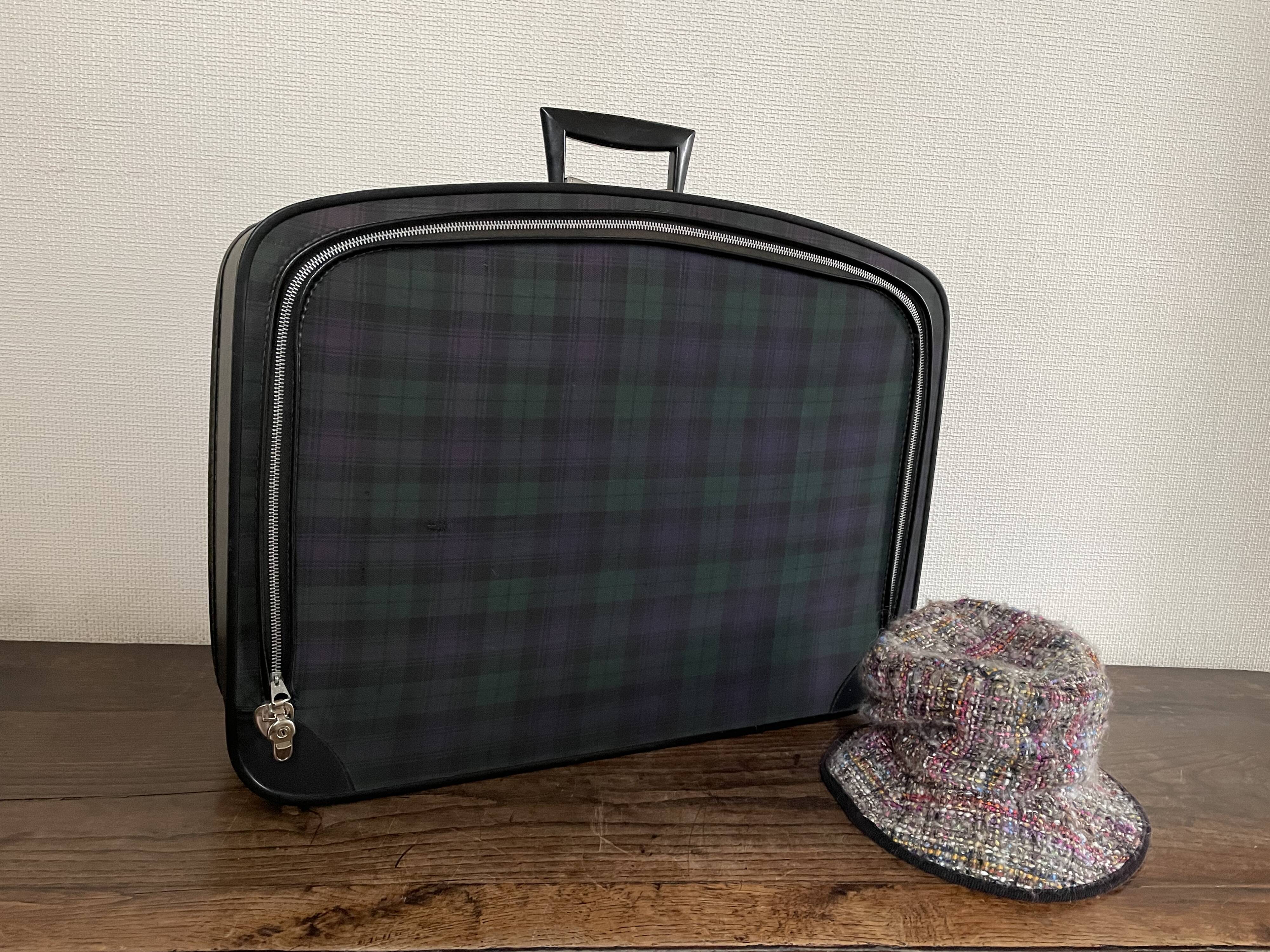 Tartan check suitcase